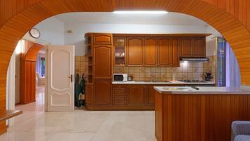 Fridge, microwave, cookware/dishes/utensils
