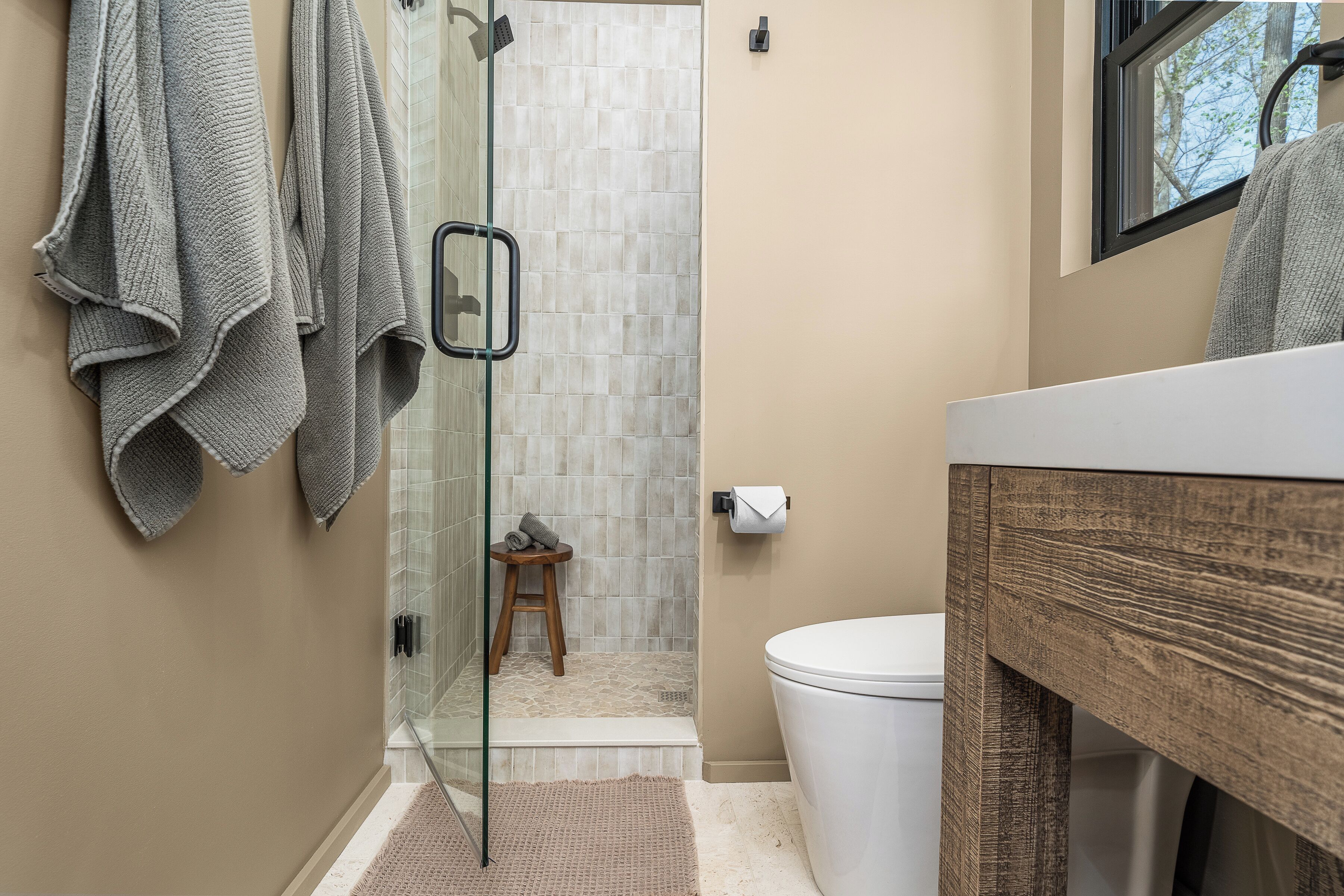 Shower, hair dryer, towels, soap