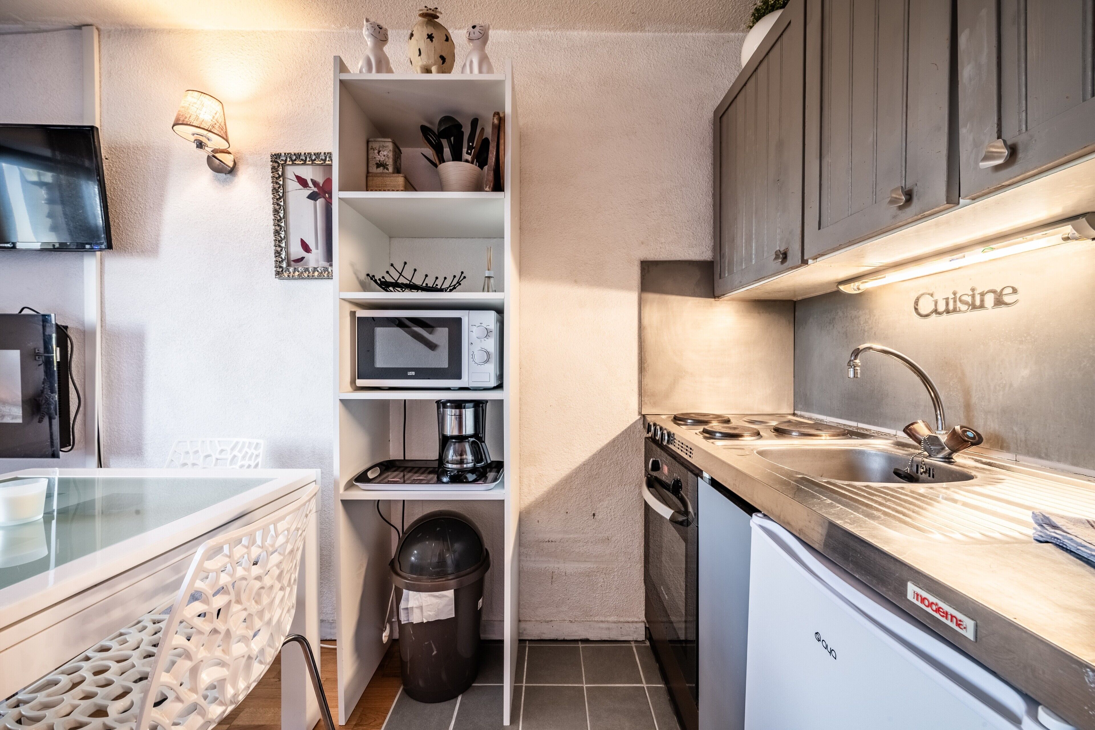 Microwave, stovetop, coffee/tea maker, electric kettle