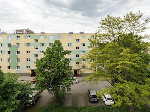 Stylish residential building with a modern design and balconies.