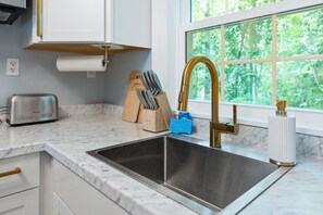 Fridge, microwave, stovetop, coffee/tea maker