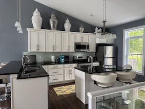 Fridge, microwave, dishwasher, coffee/tea maker