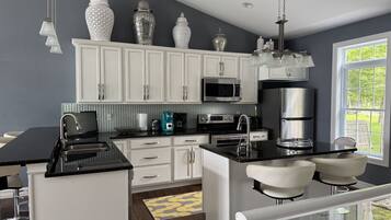 Fridge, microwave, dishwasher, coffee/tea maker
