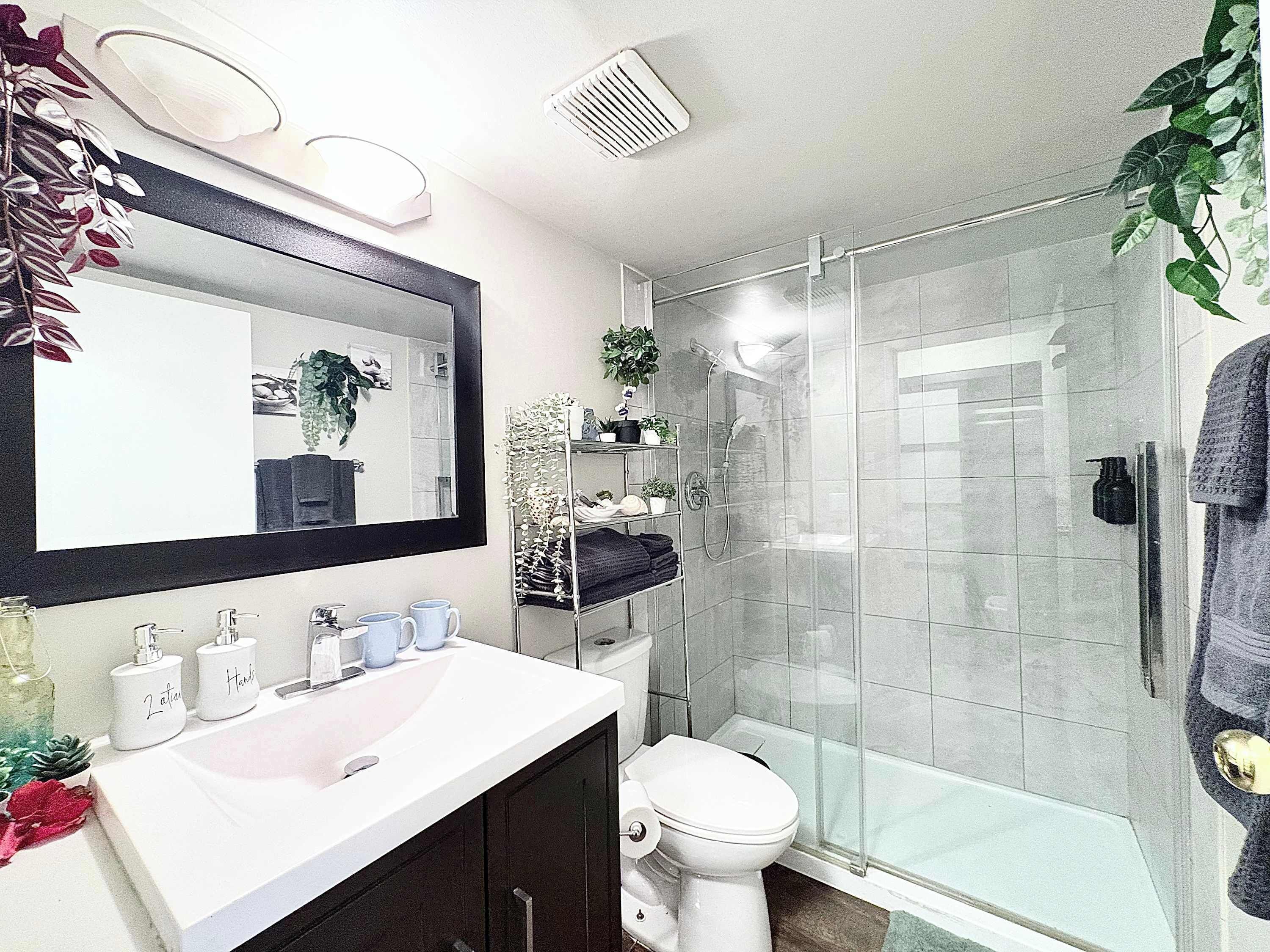 City Condo, Kitchen, Courtyard View | Bathroom | Shower, rainfall showerhead, hair dryer, towels