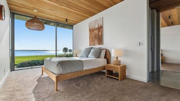 Habitación de lujo, vistas al mar | Cortinas opacas y sistema de insonorización