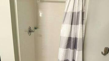 Hair dryer, towels, soap, shampoo