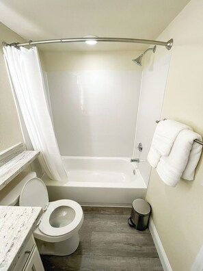 Hair dryer, towels, soap, shampoo