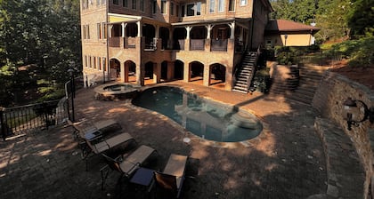 Your Private Gated Castle Escape on Lake Lanier-Beachfront, Gym, Pool &Jacuzzi!