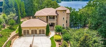 Your Private Gated  Castle Escape on Lake Lanier-Beachfront, Gym, Pool &Jacuzzi!