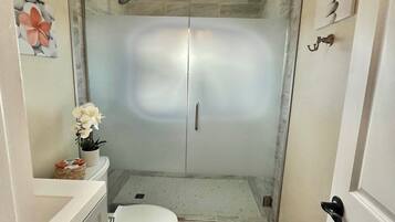 Hair dryer, towels, soap, shampoo
