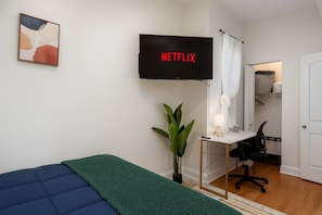 2 bedrooms, desk, iron/ironing board, travel crib