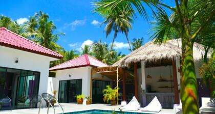 Villa Manni, bright and welcoming, nestled among coconut trees