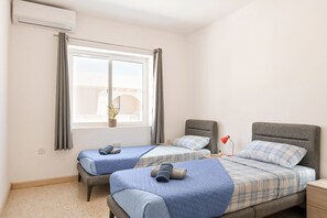 2 habitaciones, tabla de planchar con plancha y wifi gratis 