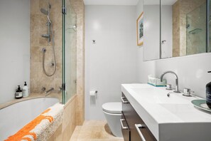 Shower, hair dryer, towels, soap