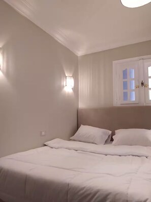 2 chambres, fer et planche à repasser, Wi-Fi, draps fournis