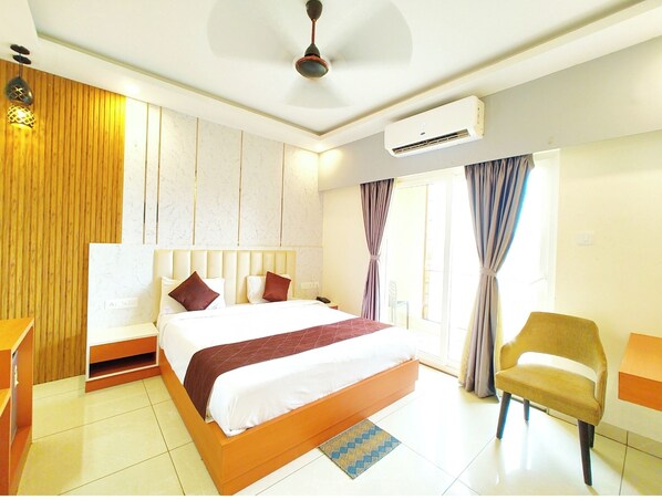 Habitación doble Deluxe | Ropa de cama hipoalergénica y caja de seguridad en la habitación 