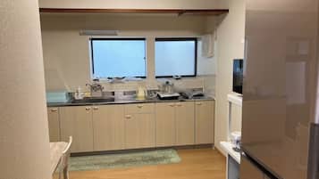 Fridge, microwave, cookware/dishes/utensils