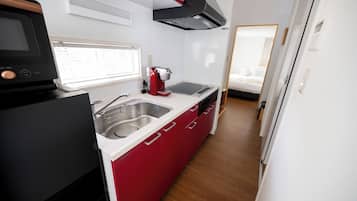 Fridge, microwave, cookware/dishes/utensils