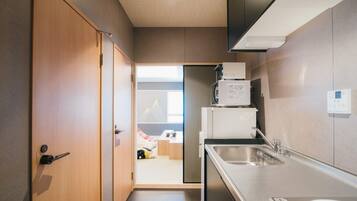 Fridge, microwave, stovetop, cookware/dishes/utensils