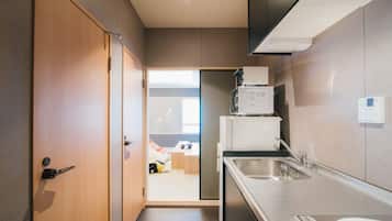 Fridge, microwave, stovetop, cookware/dishes/utensils