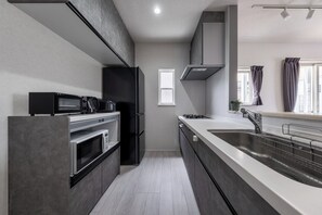 Fridge, microwave, stovetop, cookware/dishes/utensils