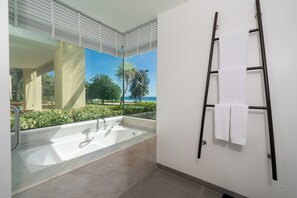 Regadera, secadora de cabello, bidet, toallas 