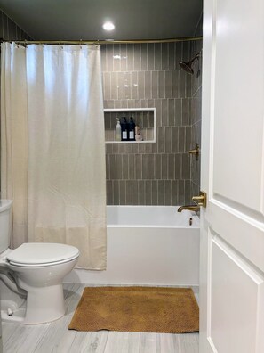 Hair dryer, towels, soap, toilet paper
