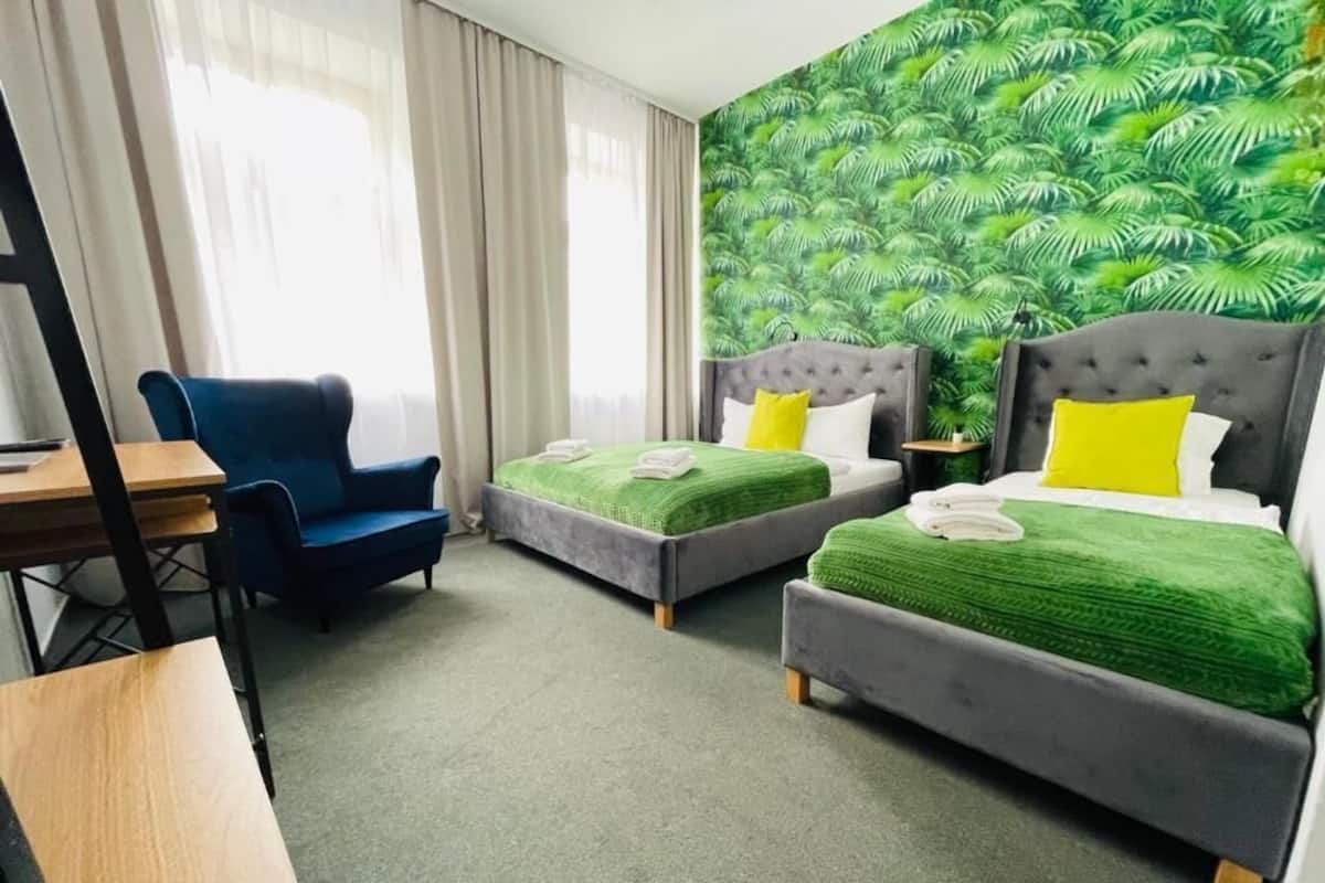 Habitación cuádruple, 2 camas matrimoniales | 1 habitación y wifi gratis