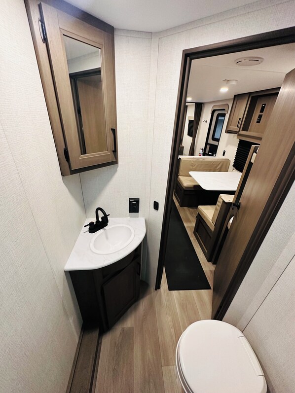 Hair dryer, towels, soap, toilet paper