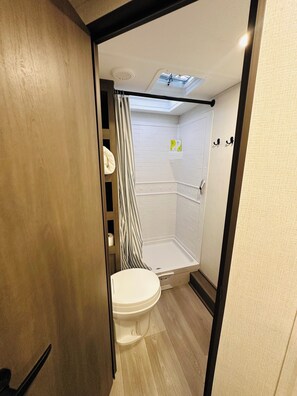Hair dryer, towels, soap, toilet paper