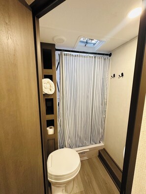 Hair dryer, towels, soap, toilet paper