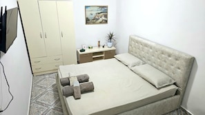 1 chambre, fer et planche à repasser, accès au Wi-Fi (inclus)