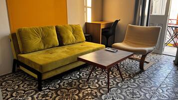 Comfort Apartment, 1 Queen Bed with Sofa bed, Air conditioning, City View | Living area | 34-inch Smart TV with digital channels, Netflix, streaming services