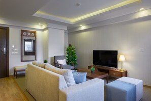 55-inch Smart TV with cable channels, Netflix, streaming services