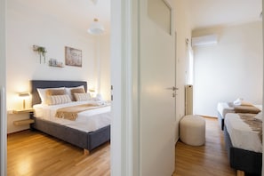 Appartement, 3 chambres, cuisine, vue ville | Rideaux occultants, fer et planche à repasser, Wi-Fi gratuit