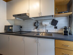 Fridge, microwave, cookware/dishes/utensils