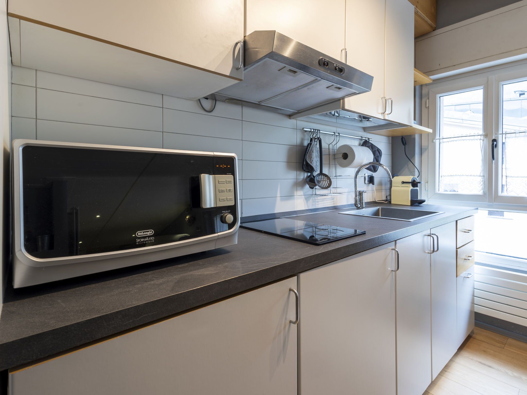 Fridge, microwave, cookware/dishes/utensils