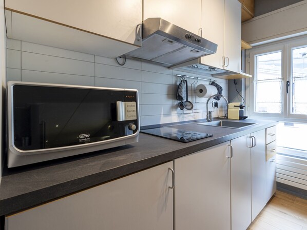 Fridge, microwave, cookware/dishes/utensils