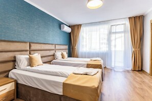 Hypo-allergenic bedding, free minibar, in-room safe, desk