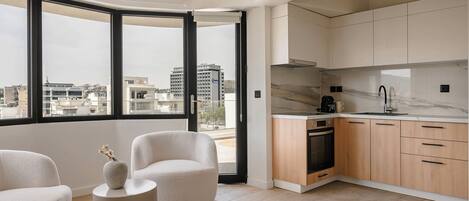 Loft, 1 Bedroom, City View | Private kitchen | Fridge, oven, stovetop, dishwasher