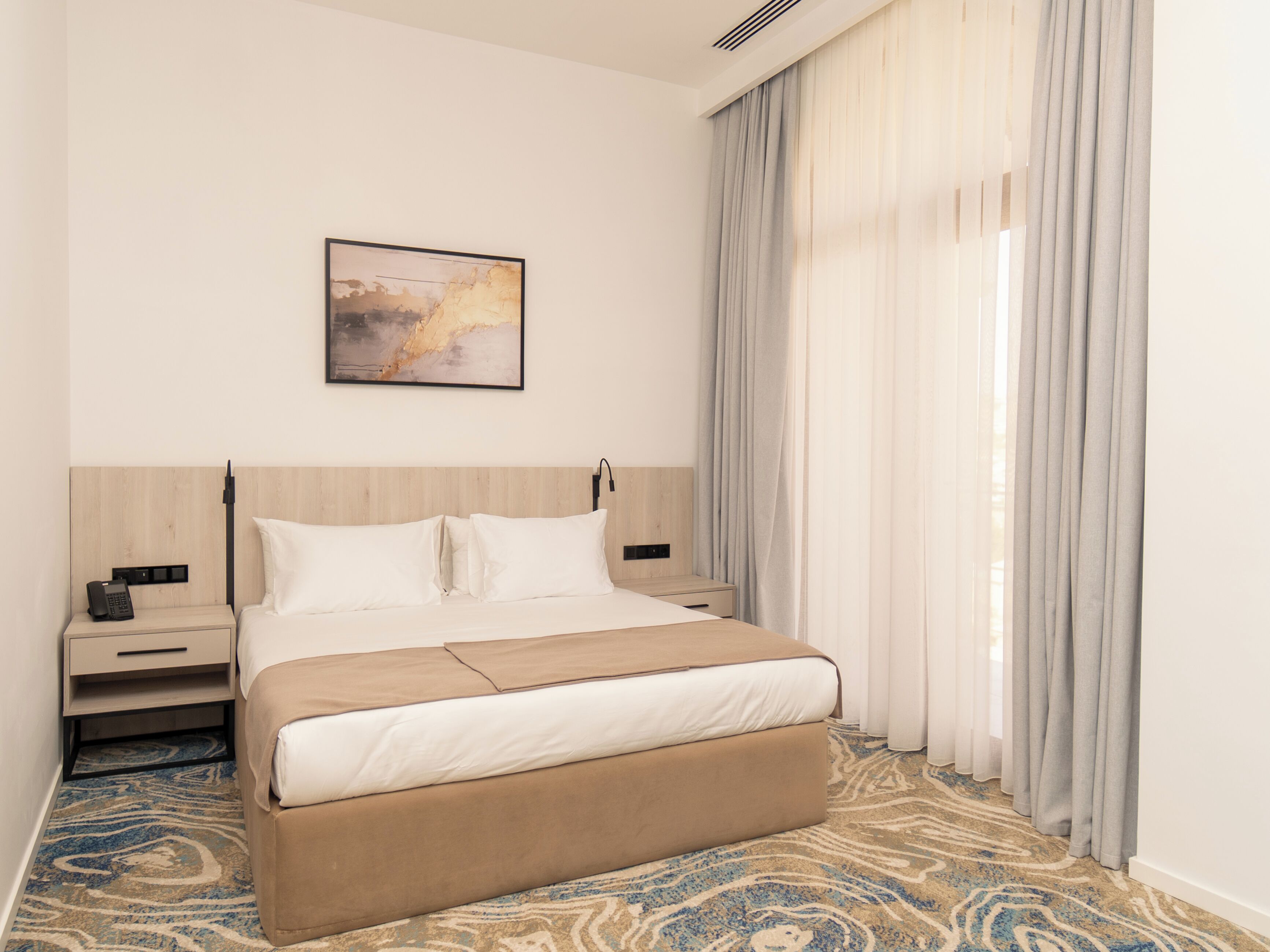 Deluxe Double or Twin Room, City View | In-room safe, desk, laptop workspace, blackout curtains