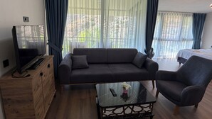 Junior Suite, 1 King Bed with Sofa bed, Non Smoking, Partial Sea View | Living area - GÜL PENSİON (Fethiye)