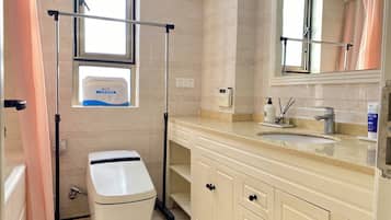 Designer toiletries, hair dryer, towels, soap