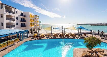 Ultimate Coastal Escape | Patio & Resort Perks