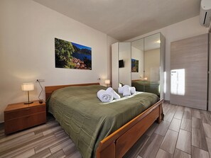 2 dormitorios, tabla de planchar con plancha, wifi y ropa de cama