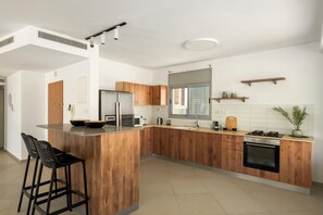 Appartement, vue mer | Cuisine privée