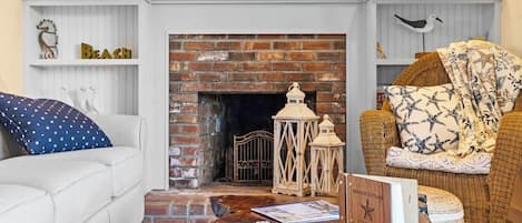 Smart TV, fireplace, books