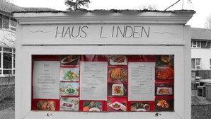 A menu board titled "HAUS LINDE" with various dishes and prices listed. - Hotel Haus Linden (Ostseebad Prerow)