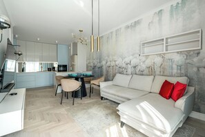 Apartment (150) | Living area | Flat-screen TV - Apartamenty Sun & Snow Nowa Letnica (Gdansk)