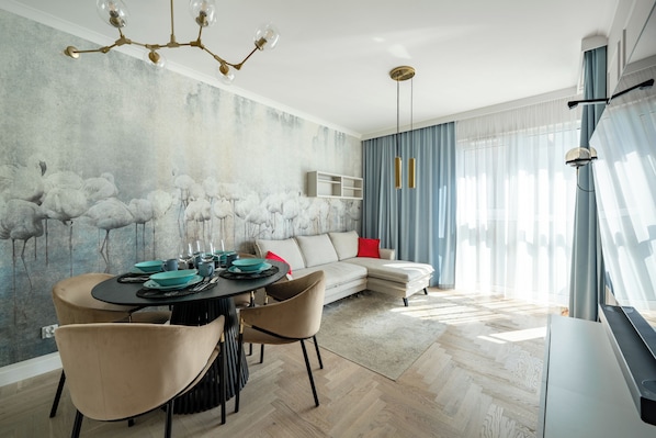 Apartment (150) | Living area | Flat-screen TV